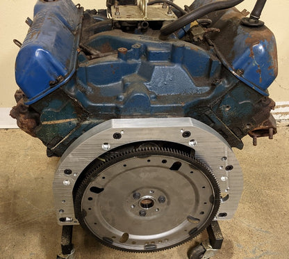 front view of transmission adapter installed on engine